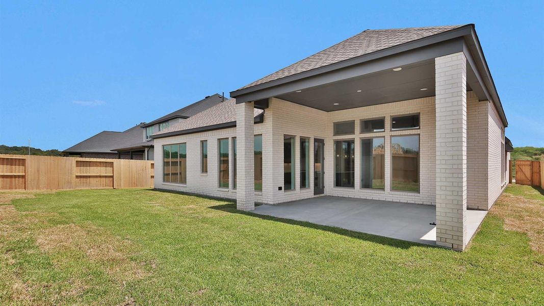 Exterior details and patio area of a home in Sienna, Missouri City (Image 2). Exterior details and patio area of a home in Sienna, Missouri City (Image 2).