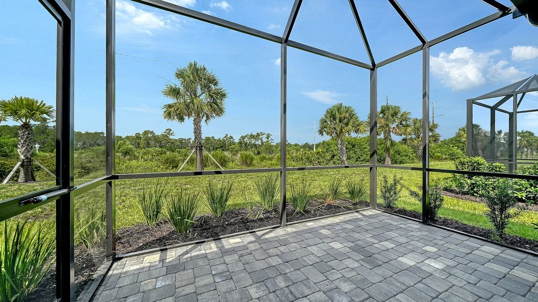 Exterior details and patio area of a home in Windward Real Estate and Homes for Sale in Sarasota, FL - Neal Communities, Lakewood Ranch (Image 21).