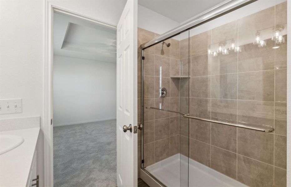 Owner's bathroom with oversized shower*real home pictured