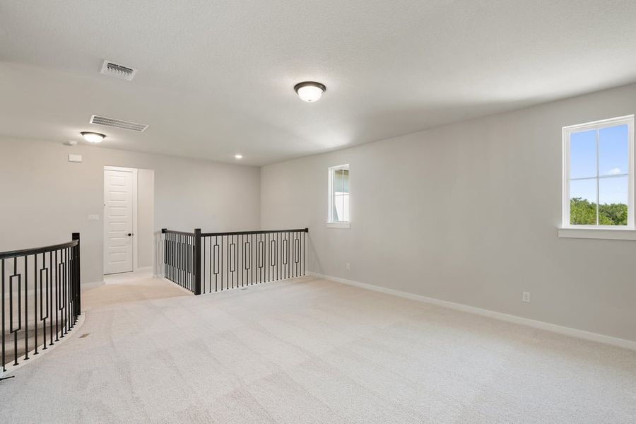 Spacious, unfurnished interior of a new home in Park Collection At Wolf Ranch, Georgetown (Image 48).