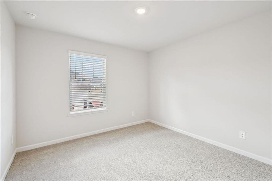 Spacious, unfurnished interior of a new home in Creekside at Oxford Park, Fairburn (Image 59).