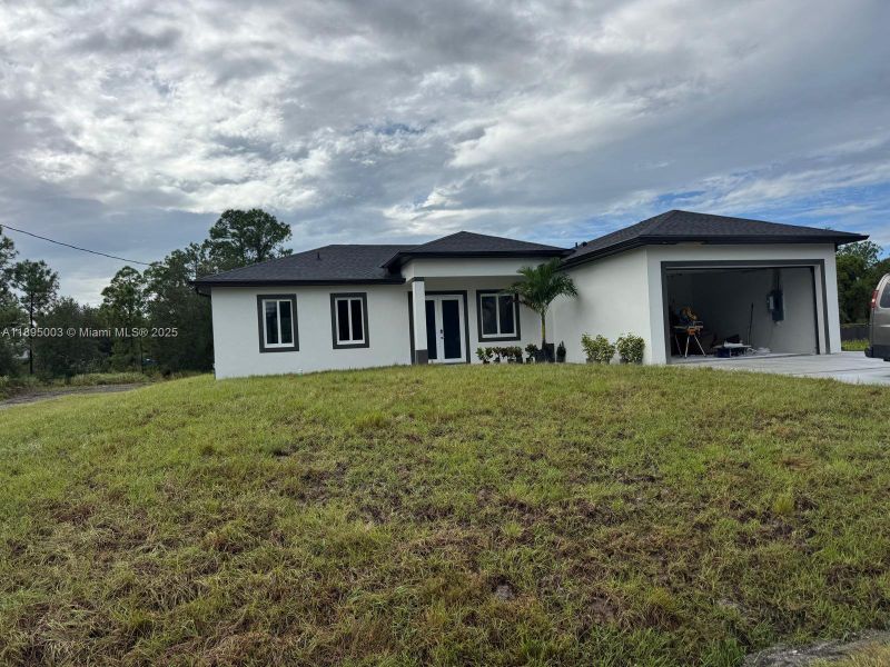 Exterior details and patio area of a home in , Lehigh Acres (Image 28).