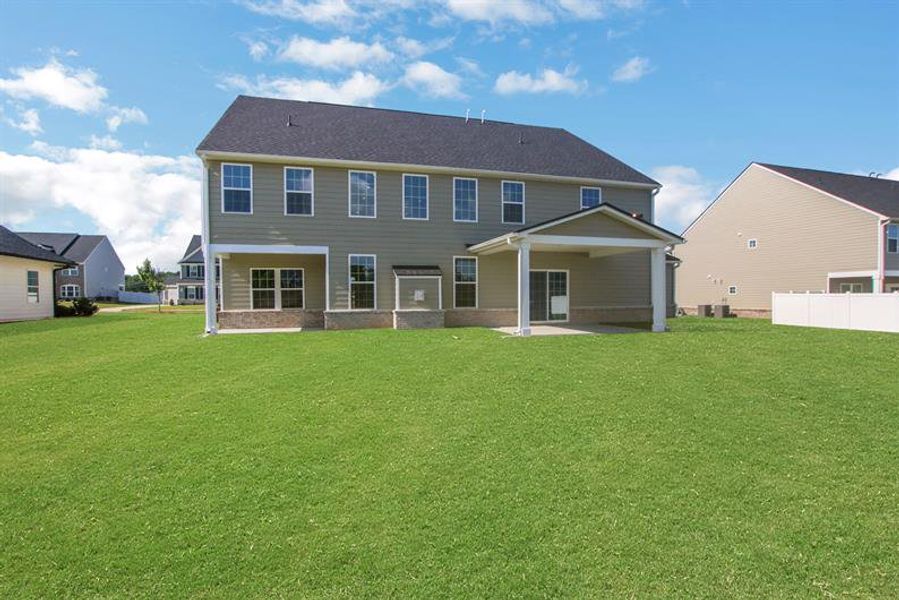 Exterior details and patio area of a home in Edinburgh, Locust Grove (Image 28).