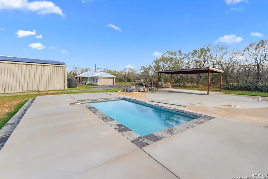 Exterior details and patio area of a home in , Adkins (Image 3).