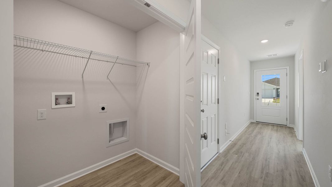 Spacious, unfurnished interior of a new home in Magnolia at the Bluffs Phase 3, Freeport (Image 16).