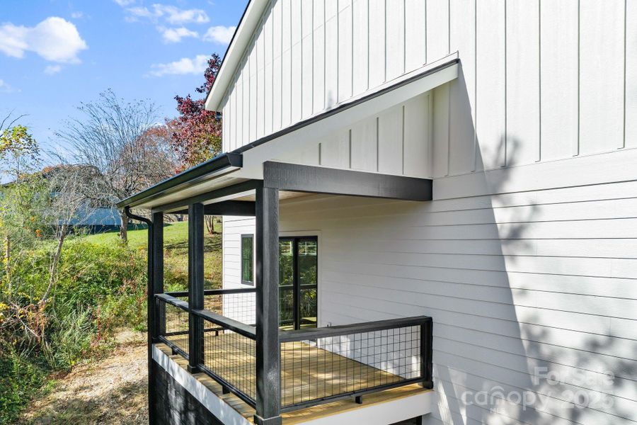 Exterior details and patio area of a home in , Weaverville (Image 28).