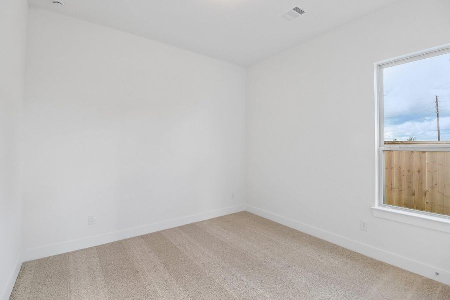 Spacious, unfurnished interior of a new home in The Grand Prairie 60', Hockley (Image 31).