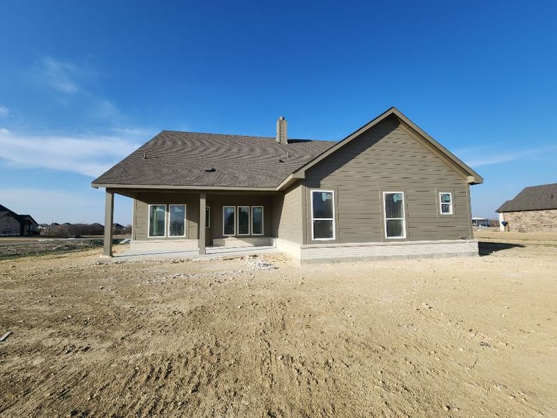 Exterior details and patio area of a home in Rocky Top, Krum (Image 3).