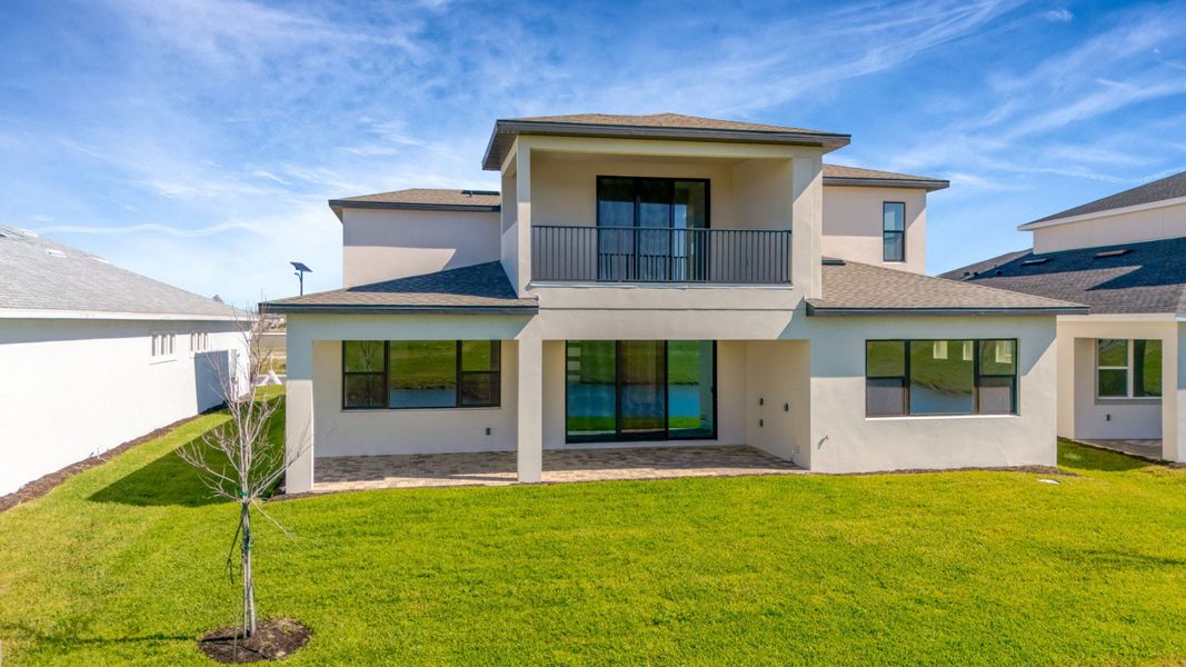 The Backyard of a DRB Homes Grand Hawk which is offered as a home plan at Serengeti in Spring Hill, FL.