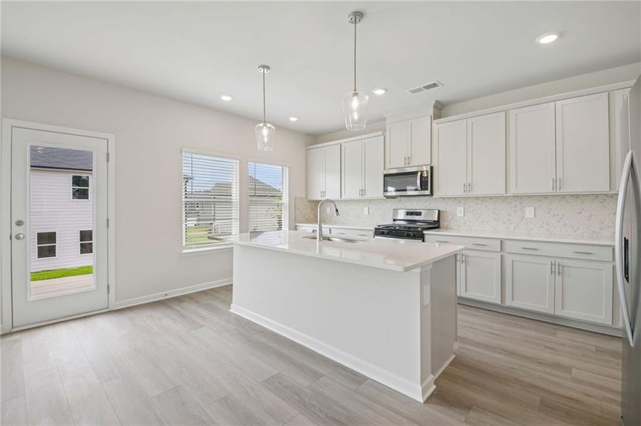 Furnished interior view inside a new home in Northwoods at Mirror Lake, Villa Rica (Image 10).