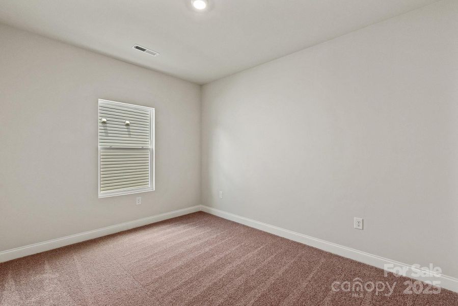 Spacious, unfurnished interior of a new home in Ascot Woods, Charlotte (Image 18).