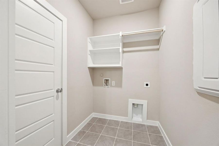 Utility Room in the Mesquite home plan by Trophy Signature Homes REPRESENTATIVE PHOTO Utility Room in the Mesquite home plan by Trophy Signature Homes REPRESENTATIVE PHOTO