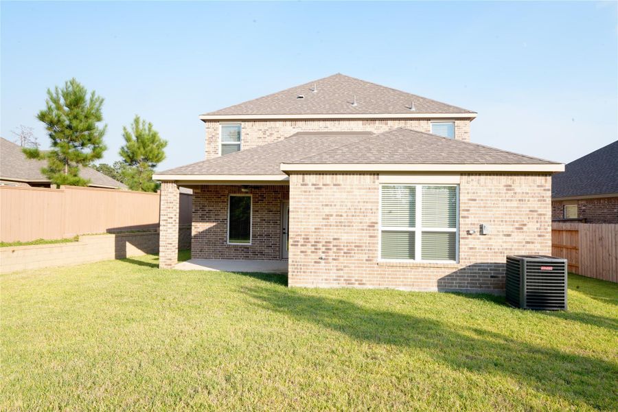 Exterior details and patio area of a home in Wedgewood Forest, Conroe (Image 15). Exterior details and patio area of a home in Wedgewood Forest, Conroe (Image 15).