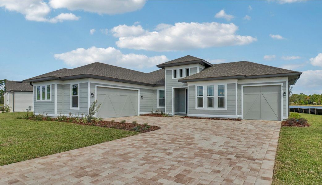Representative exterior photo of a completed home built from the Erie by Ashton Woods in Northlake at Ovation, Winter Garden, FL (Image 2). Representative exterior photo of a completed home built from the Erie by Ashton Woods in Northlake at Ovation, Winter Garden, FL (Image 2).