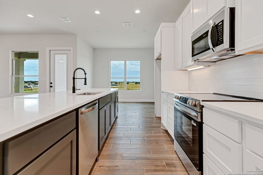 Furnished interior view inside a new home in , La Vernia (Image 13). Furnished interior view inside a new home in , La Vernia (Image 13).