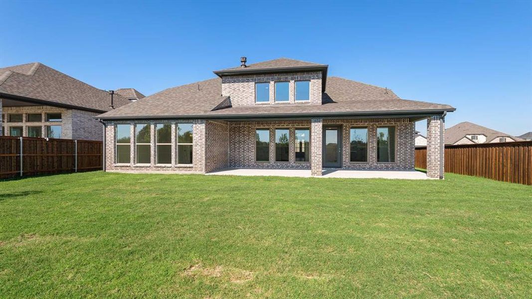 Exterior details and patio area of a home in Trinity Falls 60', McKinney (Image 3). Exterior details and patio area of a home in Trinity Falls 60', McKinney (Image 3).