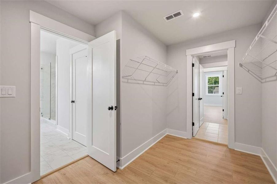Spacious, unfurnished interior of a new home in The Paddocks at Doc Hughes, Buford (Image 16).