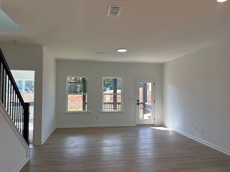 Family Room featuring the AW Collection® Serene - Open space with natural finishes and light.