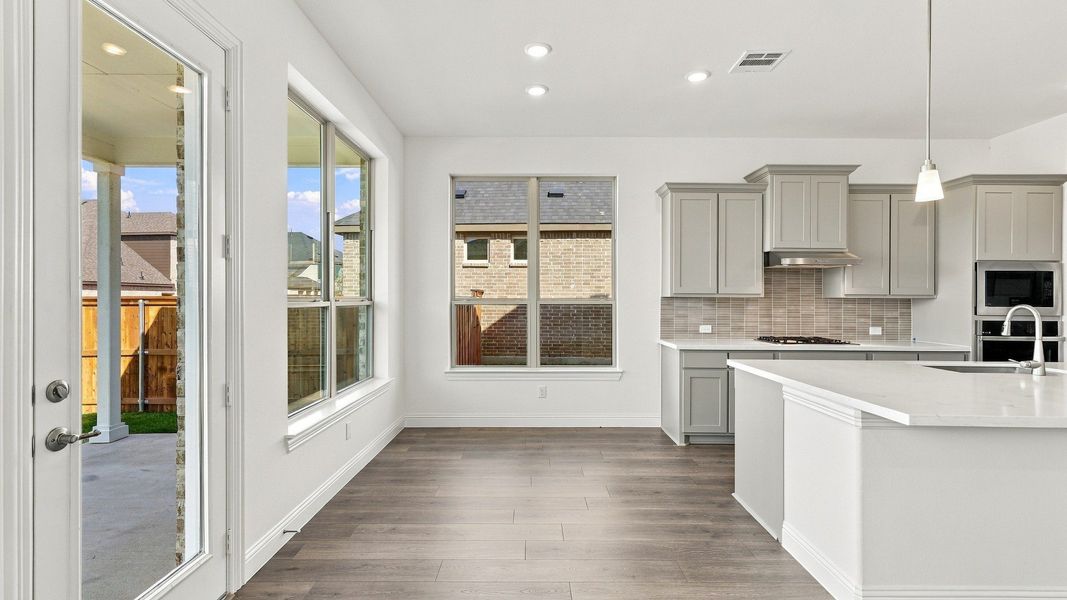 Furnished interior view inside a new home in Green Meadows Classic, Celina (Image 32).