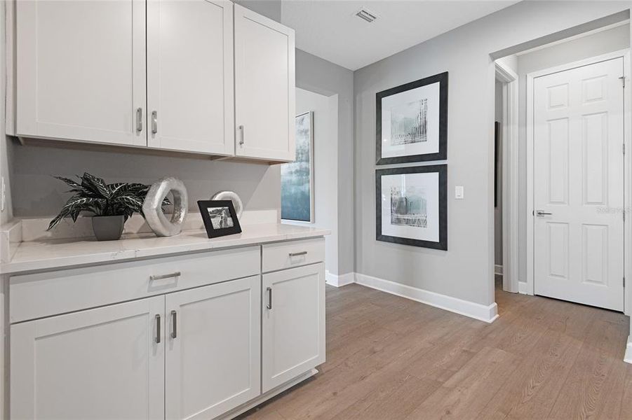 Furnished interior view inside a new home in SummerTide, Palm Coast (Image 8).