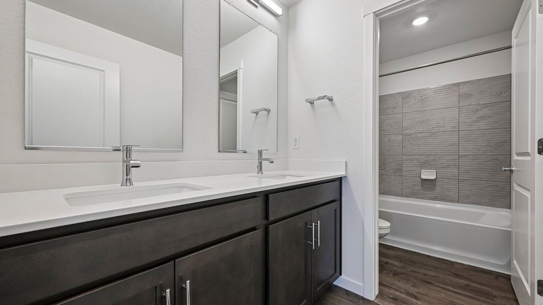 Furnished interior view inside a new home in Trails at Crowfoot, Parker (Image 9). Furnished interior view inside a new home in Trails at Crowfoot, Parker (Image 9).