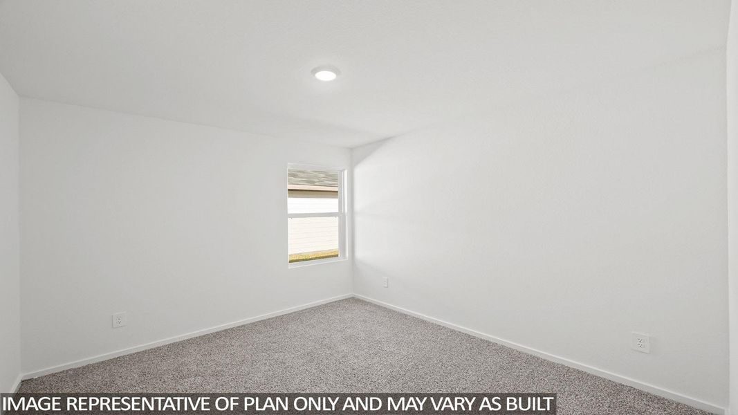 Empty room with carpet and baseboards