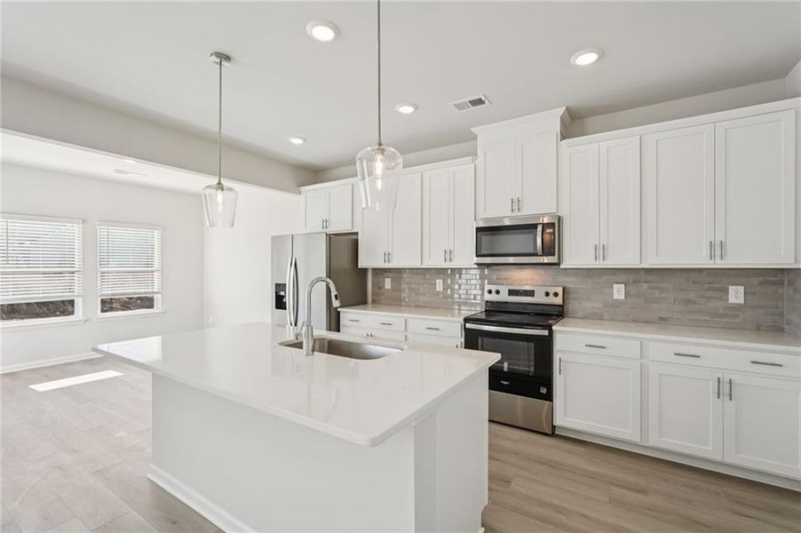 Furnished interior view inside a new home in Hawthorne Station, College Park (Image 13).