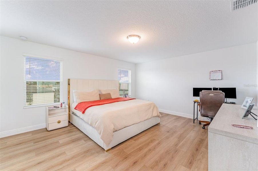 Furnished interior view inside a new home in Villamar - Signature Series, Winter Haven (Image 14).