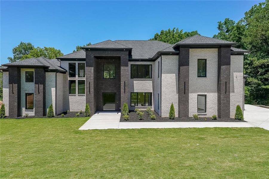 Front exterior of a new home in , Dacula, GA, highlighting curb appeal (Image 1).