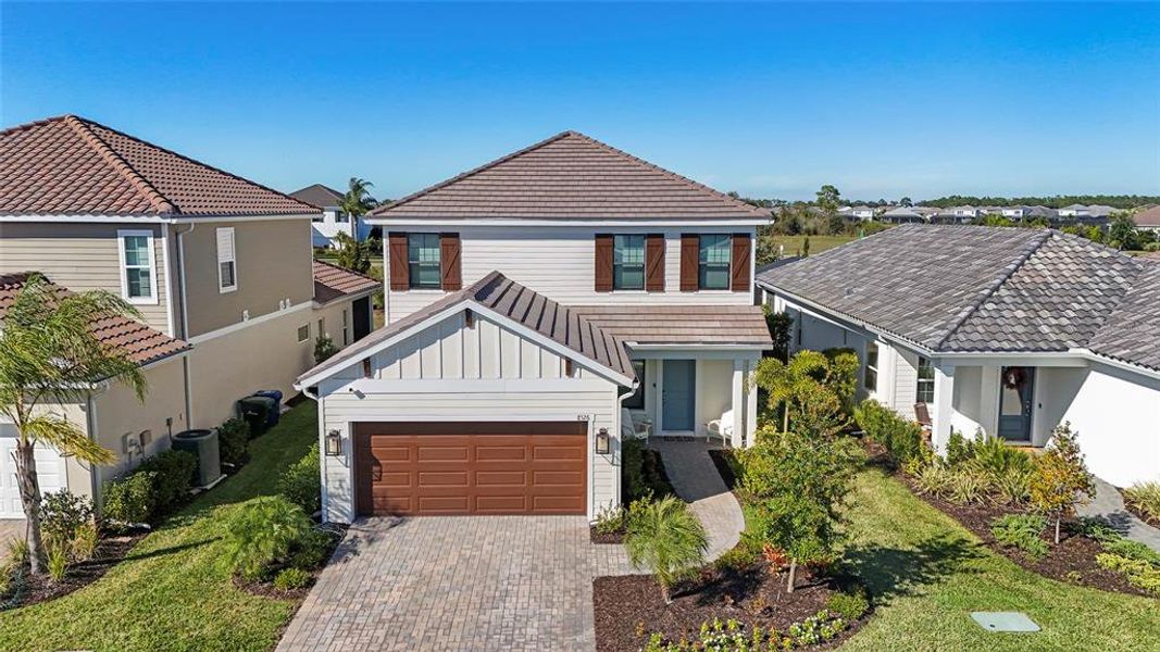 Front exterior of a new home in , Sarasota, FL, highlighting curb appeal (Image 29).
