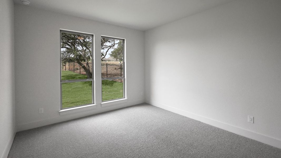 Unfurnished room featuring carpet flooring and baseboards