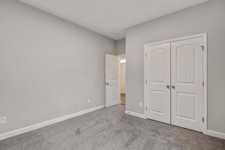Representative unfurnished interior of a home built from the Garland by Caviness & Cates Communities in Bartlett Manor, Youngsville (Image 243). Representative unfurnished interior of a home built from the Garland by Caviness & Cates Communities in Bartlett Manor, Youngsville (Image 243).