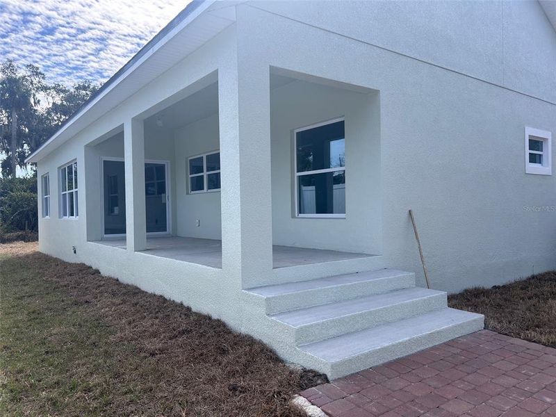 Exterior details and patio area of a home in , New Smyrna Beach (Image 13).
