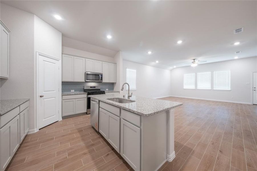 Furnished interior view inside a new home in Lake Pointe: Lake Pointe at Paloma Creek, Little Elm (Image 5). Furnished interior view inside a new home in Lake Pointe: Lake Pointe at Paloma Creek, Little Elm (Image 5).