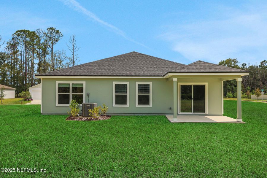 Front exterior of a new home in Wilford Oaks, Orange Park, FL, highlighting curb appeal (Image 1). Front exterior of a new home in Wilford Oaks, Orange Park, FL, highlighting curb appeal (Image 1).