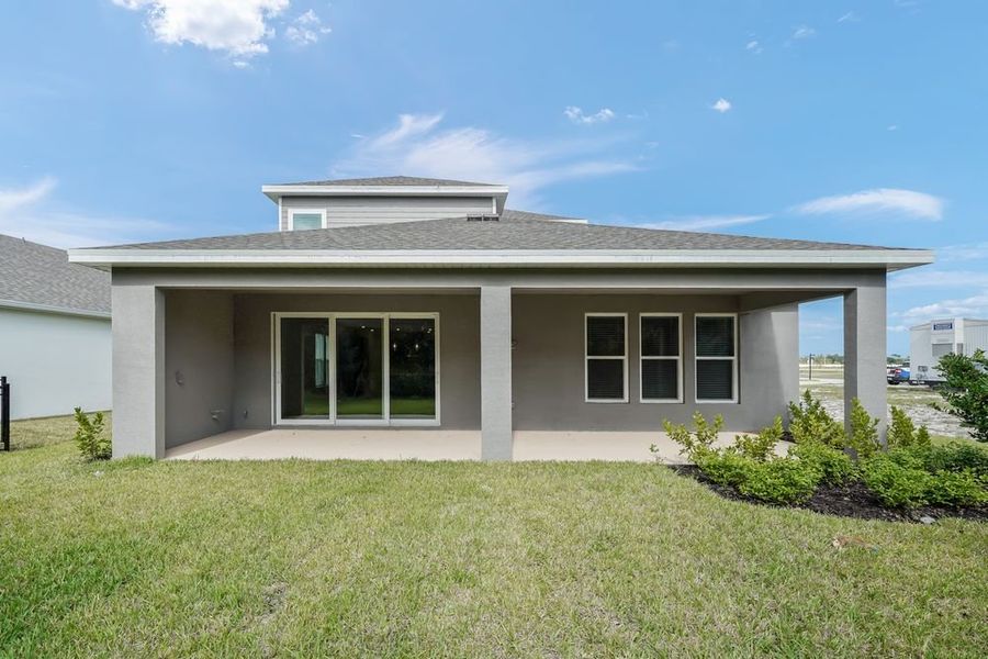 Exterior details and patio area of a home in Veranda Oaks, Port St. Lucie (Image 26).