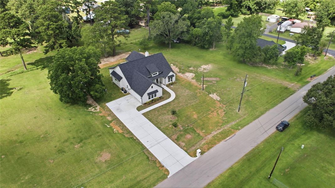 Front exterior of a new home in , Dayton, TX, highlighting curb appeal (Image 24). Front exterior of a new home in , Dayton, TX, highlighting curb appeal (Image 24).