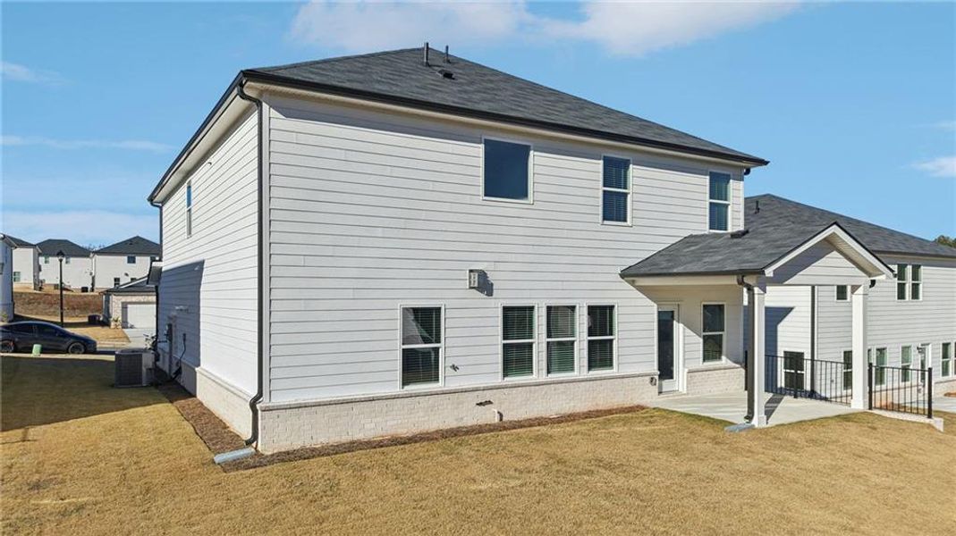 Exterior details and patio area of a home in Parkside at Grayson, Grayson (Image 23).