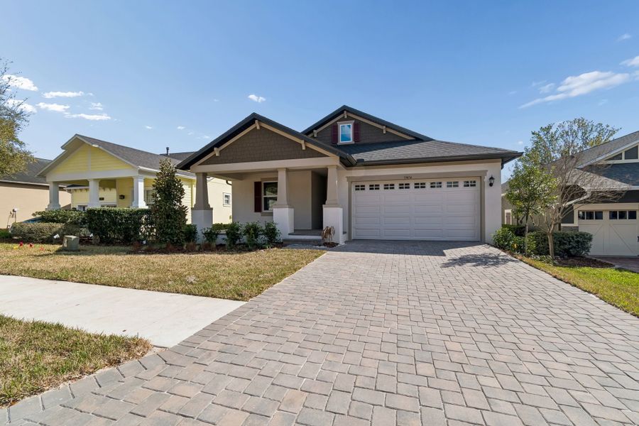 Front exterior of a new home in Southern Hills Plantation, Brooksville, FL, highlighting curb appeal (Image 29).