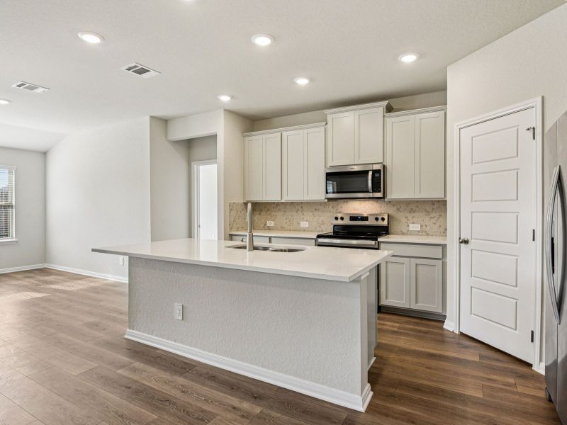 Furnished interior view inside a new home in Remington Ranch, San Antonio (Image 8). Furnished interior view inside a new home in Remington Ranch, San Antonio (Image 8).
