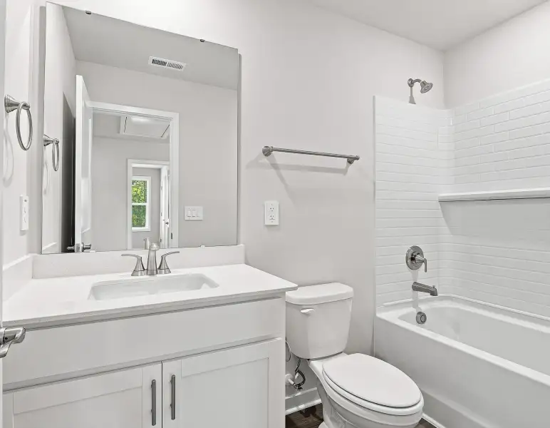 Furnished interior view inside a new home in Country Lane - Classic Series, Clayton (Image 9).