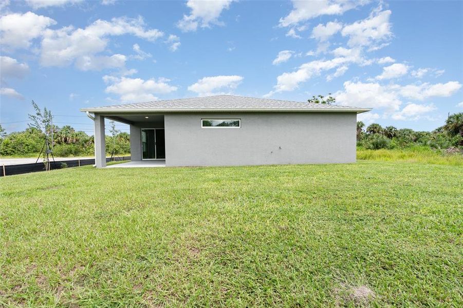 Exterior details and patio area of a home in , Palm Bay (Image 12).
