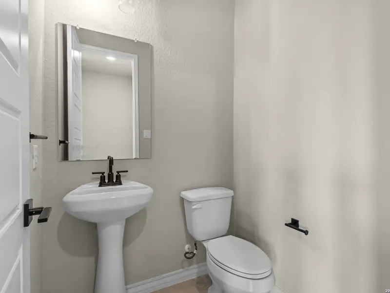 Furnished interior view inside a new home in The Reserve at Potranco Oaks, Castroville (Image 21).