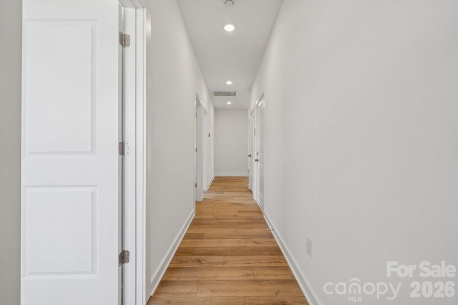 Spacious, unfurnished interior of a new home in Meadow Creek Village, Locust (Image 16).