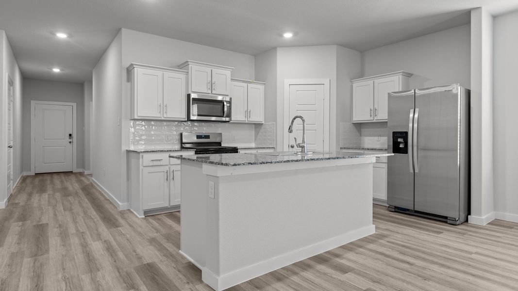 Representative furnished interior of a home built from the LAKE FORT by D.R. Horton in Heritage Parks, Abilene (Image 6).