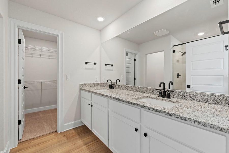 Furnished interior view inside a new home in Whisper Valley, Manor (Image 8).