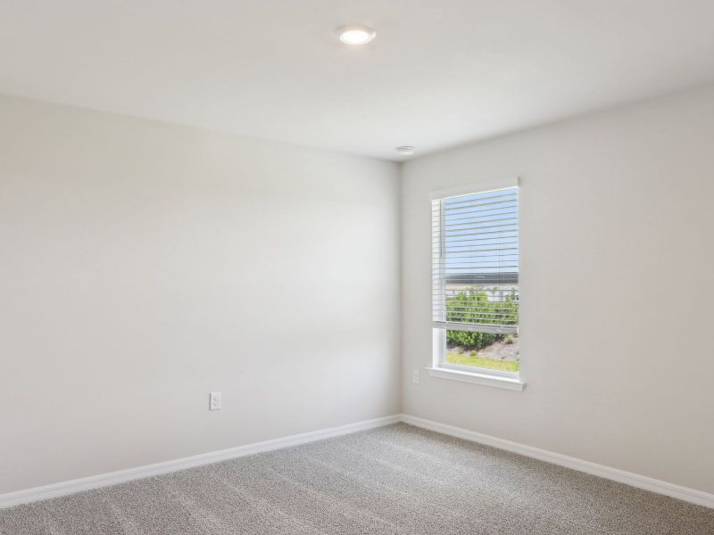 Bedroom in the Ibis floorplan at 44518 Cable Creek Dr