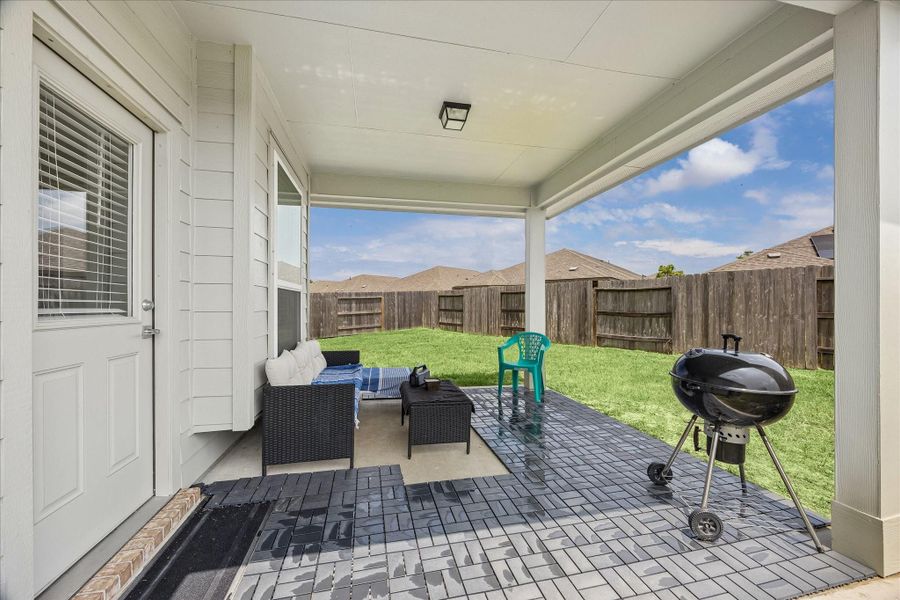 Exterior details and patio area of a home in Sierra Vista, Iowa Colony (Image 3).