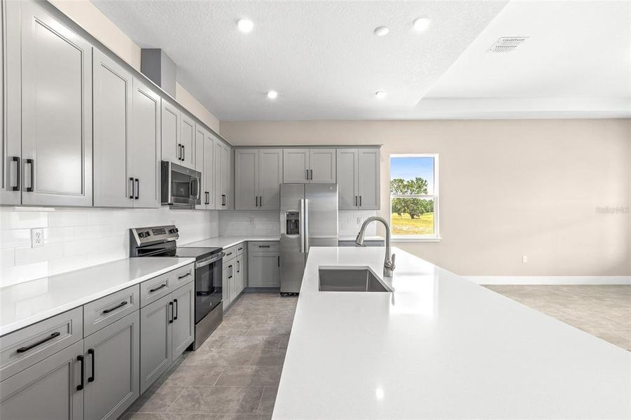 Furnished interior view inside a new home in Gray Hawk at Hole Two, Daytona Beach (Image 14). Furnished interior view inside a new home in Gray Hawk at Hole Two, Daytona Beach (Image 14).