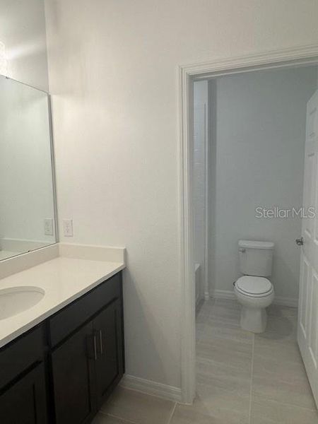 Furnished interior view inside a new home in Brack Ranch, St. Cloud (Image 8).